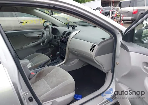 2009 Toyota Corolla Le from USA, damaged, VIN 1NXBU40E69Z157646